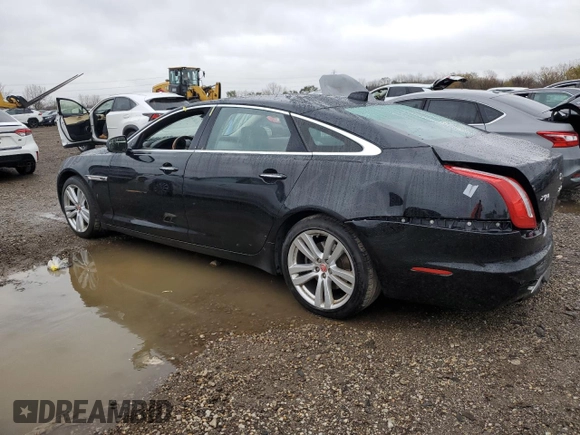 2016 Jaguar XJ Portfolio with VIN SAJWJ2GD8G8W02010, listed as a Copart auction lot 79011404 with Not Provided miles and Salvage Title. Bid and sale history available at DreamBid. Image 2.