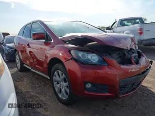 2009 Mazda CX-7 Sport z VIN JM3ER29L590227337, wystawiony jako IAAI lot #42344264 z przebiegiem 140 433 mil mil oraz . Historia ofert i sprzedaży dostępna na DreamBid. Obrazek 1.