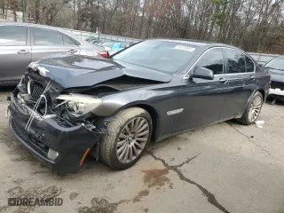 2012 BMW 7 Series 750i xDrive with VIN WBAKC6C52CC396443, listed as a Copart auction lot 44333945 with 134,075 mi miles and Salvage Title. Bid and sale history available at carsss.com. Image 1.