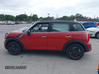 2013 MINI Countryman S z VIN WMWZC3C51DWP22150, wystawiony jako IAAI lot #41973886 z przebiegiem 28 947 mil mil oraz . Historia ofert i sprzedaży dostępna na DreamBid. Obrazek 14.