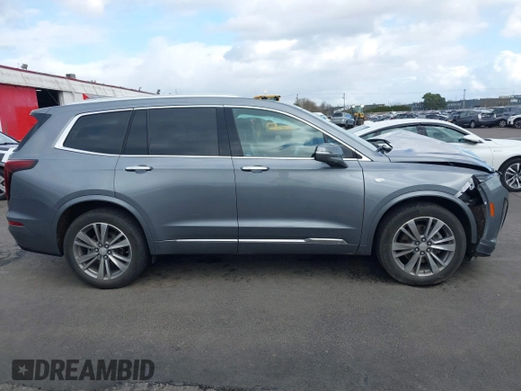 2021 Cadillac XT6 Premium Luxury with VIN 1GYKPDRS2MZ228111, listed as a IAAI auction lot 41671112 with 45,980 mi miles. Bid and sale history available at carsss.com. Image 13.