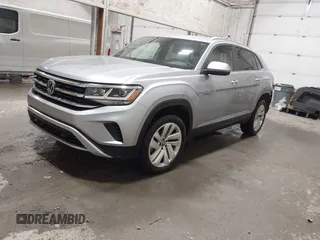 2023 Volkswagen Atlas SE z VIN 1V2KC2CA6PC210593, wystawiony jako IAAI lot #41957633 z przebiegiem 34 801 mil mil oraz . Historia ofert i sprzedaży dostępna na DreamBid. Obrazek 18.