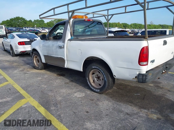 2002 Ford F-150 XL with VIN 1FTRF17W52NB71693, listed as a IAAI auction lot 41952405 with 121,917 mi miles. Bid and sale history available at carsss.com. Image 3.