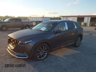 2019 Mazda CX-9 Signature with VIN JM3TCBEY5K0331147, listed as a IAAI auction lot 42026101 with 64,499 mi miles and . Bid and sale history available at DreamBid. Image 2.