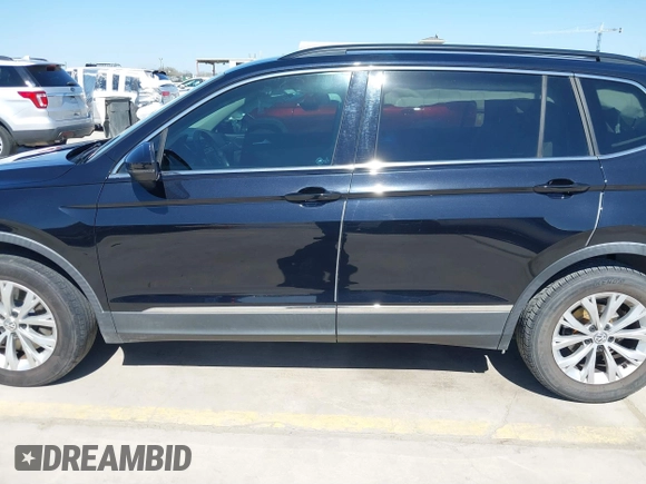 2018 Volkswagen Tiguan SEL with VIN 3VV3B7AX3JM064061, listed as a IAAI auction lot 41772564 with 95,395 mi miles and . Bid and sale history available at DreamBid. Image 14.