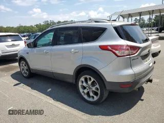 2013 Ford Escape Titanium z VIN 1FMCU0J96DUB50607, wystawiony jako Copart lot #55999745 z przebiegiem 177 798 mil mil oraz Czysty tytuł • Clean title. Historia ofert i sprzedaży dostępna na DreamBid. Obrazek 2.