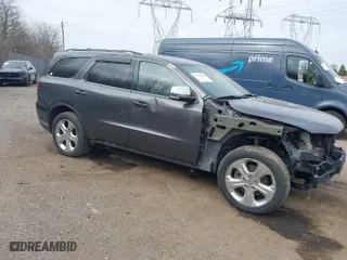 2014 Dodge Durango Limited with VIN 1C4SDJDTXEC345520, listed as a IAAI auction lot 41406601 with 148,216 mi miles. Bid and sale history available at carsss.com. Image 1.