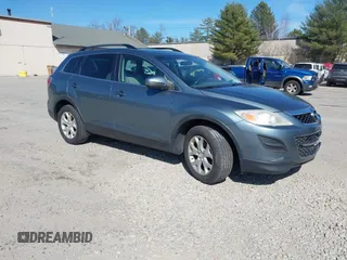 2012 Mazda CX-9 Touring z VIN JM3TB3CV7C0361690, wystawiony jako IAAI lot #41804539 z przebiegiem 133 861 mil mil oraz . Historia ofert i sprzedaży dostępna na DreamBid. Obrazek 1.