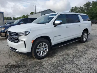 2023 Chevrolet Suburban Premier z VIN 1GNSCFKD0PR504435, wystawiony jako Copart lot #60309665 z przebiegiem 50 744 mil mil oraz Czysty tytuł • Clean title. Historia ofert i sprzedaży dostępna na DreamBid. Obrazek 1.