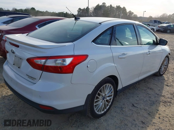 2013 Ford Focus Titanium with VIN 1FADP3J22DL167324, listed as a IAAI auction lot 41616927 with 127,259 mi miles and . Bid and sale history available at carsss.com. Image 4.