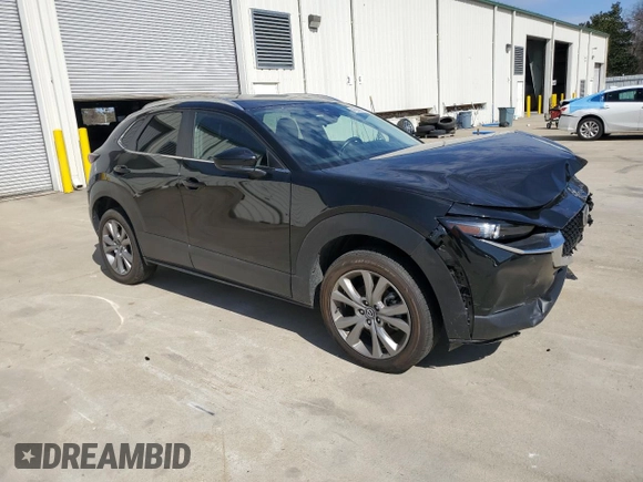 2023 Mazda CX-30 S Carbon Edition with VIN 3MVDMBCM4PM527285, listed as a Copart auction lot 47938225 with 29,650 mi miles and Salvage title. Bid and sale history available at DreamBid. Image 4.