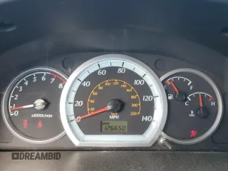 2007 Suzuki Reno z VIN KL5JD66Z57K670570, wystawiony jako Copart lot #79906524 z przebiegiem 126 550 mil mil oraz Szkody całkowita. Historia ofert i sprzedaży dostępna na DreamBid. Obrazek 9.