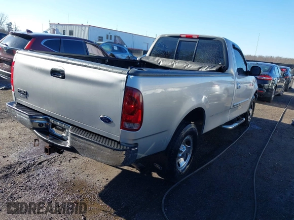 2002 Ford F-150 XL with VIN 1FTRF17242NA48027, listed as a IAAI auction lot 41838636 with 69,821 mi miles. Bid and sale history available at carsss.com. Image 4.