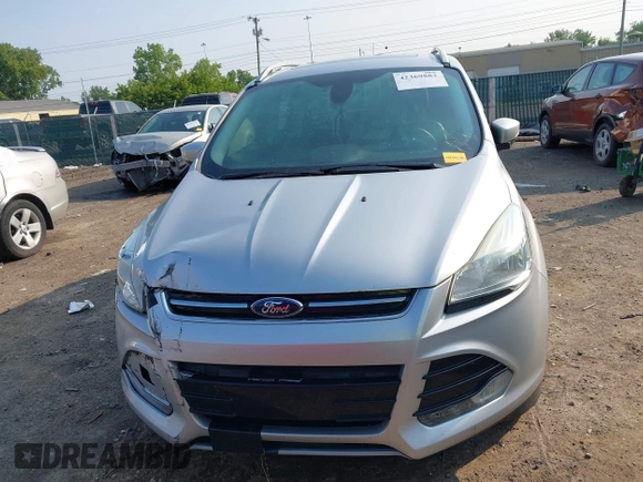 2015 Ford Escape Titanium z VIN 1FMCU0J90FUC02039, wystawiony jako IAAI lot #42369882 z przebiegiem 156 287 mil mil oraz . Historia ofert i sprzedaży dostępna na DreamBid. Obrazek 11.