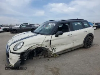 2017 MINI Clubman Cooper S with VIN WMWLU5C52H2E81245, listed as a Copart auction lot 46339385 with 57,263 mi miles and Salvage Title. Bid and sale history available at carsss.com. Image 1.