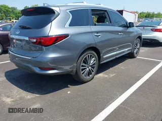 2019 Infiniti QX60 Pure with VIN 5N1DL0MN7KC563655, listed as a IAAI auction lot 42469111 with 84,864 mi miles and . Bid and sale history available at DreamBid. Image 4.