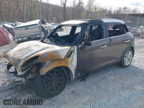 2013 MINI Cooper Countryman with VIN WMWZB3C59DWM31642, listed as a IAAI auction lot 40794983 with 1 mi miles. Bid and sale history available at carsss.com. Image 2.