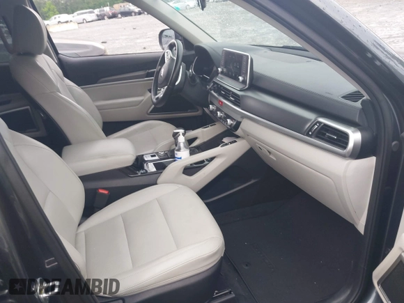 2021 Kia Telluride S with VIN 5XYP64HC8MG127498, listed as a IAAI auction lot 42371890 with 100,748 mi miles and . Bid and sale history available at DreamBid. Image 5.