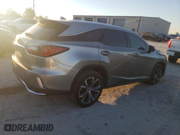 2021 Lexus RX 350L z VIN JTJHZKEA0M2019757, wystawiony jako Copart lot #71006144 z przebiegiem Nie podano mil oraz Szkoda całkowita • Salvage title. Historia ofert i sprzedaży dostępna na DreamBid. Obrazek 3.