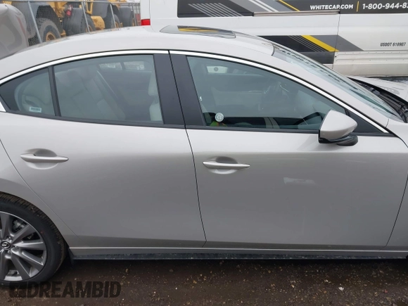 2025 Mazda 3 S Preferred with VIN JM1BPACM6S1768801, listed as a IAAI auction lot 41417279 with 1,273 mi miles and . Bid and sale history available at DreamBid. Image 13.