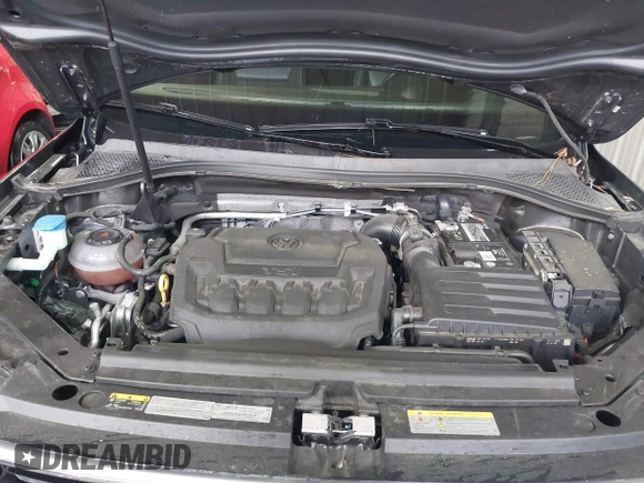 2021 Volkswagen Tiguan SE with VIN 3VV2B7AX0MM039117, listed as a IAAI auction lot 41991481 with 36,824 mi miles and . Bid and sale history available at DreamBid. Image 10.