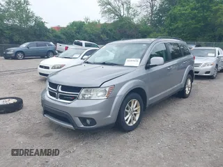 2016 Dodge Journey SXT z VIN 3C4PDDBG4GT173148, wystawiony jako IAAI lot #42269438 z przebiegiem 211 014 mil mil oraz . Historia ofert i sprzedaży dostępna na DreamBid. Obrazek 2.
