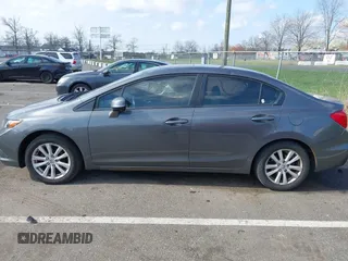 2012 Honda Civic EX-L with VIN 2HGFB2F94CH307646, listed as a IAAI auction lot 42006923 with 260,917 mi miles and . Bid and sale history available at DreamBid. Image 14.