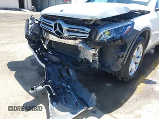 2018 Mercedes-Benz GLC 300 with VIN WDC0G4JB9JV056407, listed as a IAAI auction lot 41965217 with 77,228 mi miles and . Bid and sale history available at DreamBid. Image 6.
