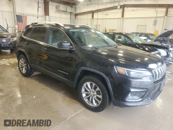 2019 Jeep Cherokee Altitude with VIN 1C4PJMLX5KD386597, listed as a Copart auction lot 59132655 with 129,243 mi miles and Salvage title. Bid and sale history available at DreamBid. Image 4.