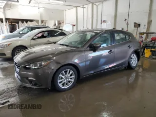 2015 Mazda 3 i Grand Touring with VIN JM1BM1M75F1231814, listed as a Copart auction lot 62692695 with 49,253 mi miles and Salvage title. Bid and sale history available at DreamBid. Image 1.