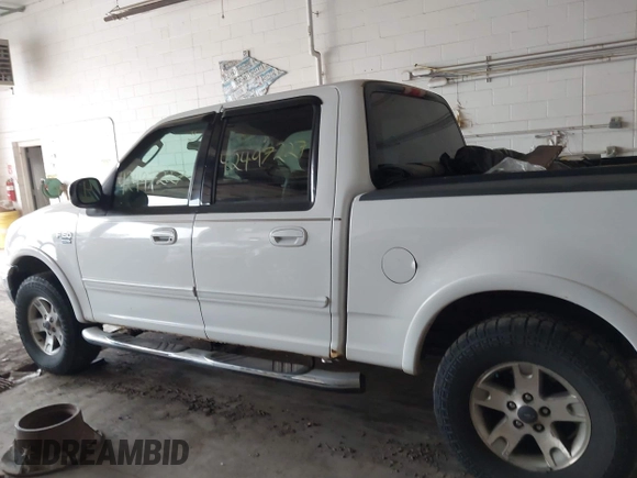 2003 Ford F-150 XLT with VIN 1FTRW08L03KB51627, listed as a IAAI auction lot 42497227 with 330,207 mi miles and . Bid and sale history available at DreamBid. Image 14.