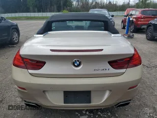 2012 BMW 6 Series 650i z VIN WBALZ3C52CC397545, wystawiony jako Copart lot #55976625 z przebiegiem 147 352 mil mil oraz Tytuł czysty. Historia ofert i sprzedaży dostępna na DreamBid. Obrazek 6.