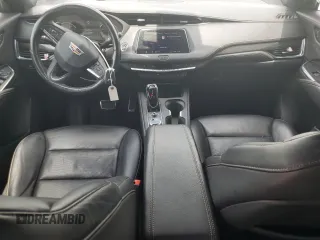 2020 Cadillac XT4 FWD Sport with VIN 1GYFZER49LF123830, listed as a Copart auction lot 55737985 with 98,871 mi miles and Salvage title. Bid and sale history available at DreamBid. Image 8.