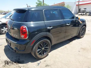 2015 MINI Countryman S with VIN WMWZC3C5XFWT02566, listed as a IAAI auction lot 42408045 with 114,822 mi miles and . Bid and sale history available at DreamBid. Image 4.