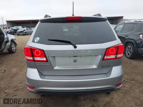 2019 Dodge Journey SE with VIN 3C4PDCBG9KT869149, listed as a IAAI auction lot 41472289 with 97,333 mi miles and . Bid and sale history available at DreamBid. Image 17.