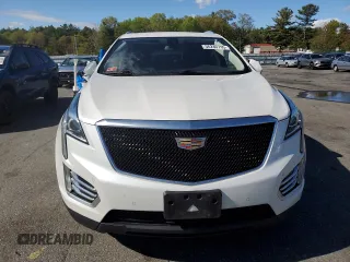 2017 Cadillac XT5 Luxury AWD z VIN 1GYKNDRS6HZ280840, wystawiony jako Copart lot #56240795 z przebiegiem 138 859 mil mil oraz Szkoda całkowita • Salvage title. Historia ofert i sprzedaży dostępna na DreamBid. Obrazek 5.