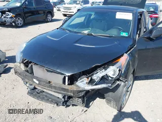 2013 Hyundai Veloster w/Gray Int with VIN KMHTC6AD4DU131242, listed as a IAAI auction lot 42074517 with 76,713 mi miles and . Bid and sale history available at DreamBid. Image 6.