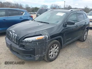 2014 Jeep Cherokee Latitude z VIN 1C4PJLCBXEW172745, wystawiony jako IAAI lot #41718415 z przebiegiem 115 777 mil mil oraz . Historia ofert i sprzedaży dostępna na DreamBid. Obrazek 2.