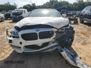 2014 BMW M6 z VIN WBSLX9C53ED160497, wystawiony jako Copart lot #62826444 z przebiegiem 55 639 mil mil oraz Szkody całkowita. Historia ofert i sprzedaży dostępna na DreamBid. Obrazek 5.