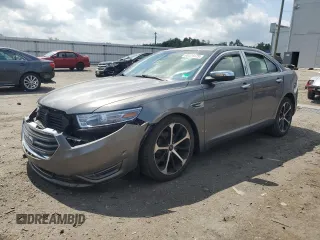 2014 Ford Taurus Limited with VIN 1FAHP2J86EG130738, listed as a Copart auction lot 60024475 with 105,824 mi miles and Salvage title. Bid and sale history available at DreamBid. Image 1.