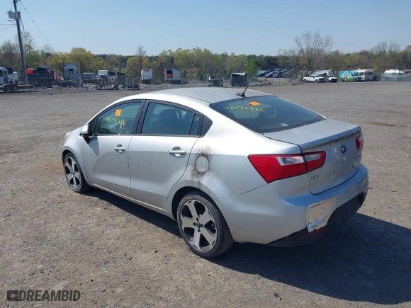2014 Kia Rio EX with VIN KNADN4A34E6352924, listed as a IAAI auction lot 42072886 with 1 mi miles. Bid and sale history available at carsss.com. Image 3.