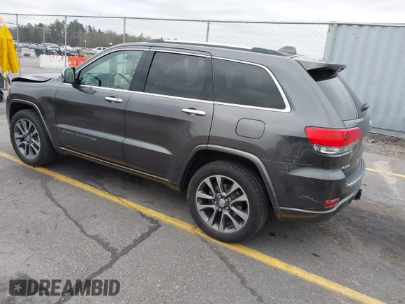 2018 Jeep Grand Cherokee High Altitude with VIN 1C4RJFCG5JC321712, listed as a IAAI auction lot 41616494 with 159,598 mi miles. Bid and sale history available at carsss.com. Image 3.