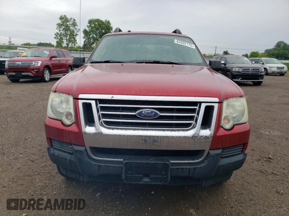 2007 Ford Explorer Sport Trac XLT z VIN 1FMEU51KX7UA39006, wystawiony jako Copart lot #63332175 z przebiegiem 168 646 mil mil oraz Czysty tytuł • Clean title. Historia ofert i sprzedaży dostępna na DreamBid. Obrazek 5.