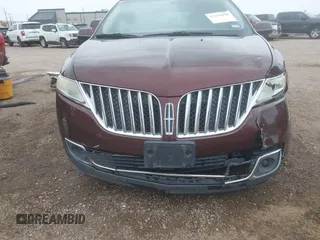2012 Lincoln MKX z VIN 2LMDJ6JK8CBL08425, wystawiony jako IAAI lot #42312678 z przebiegiem 113 512 mil mil oraz . Historia ofert i sprzedaży dostępna na DreamBid. Obrazek 6.