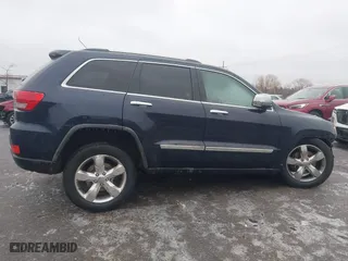 2012 Jeep Grand Cherokee Overland with VIN 1C4RJFCT9CC182216, listed as a IAAI auction lot 41490446 with 153,237 mi miles. Bid and sale history available at carsss.com. Image 13.
