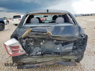 2012 Nissan Sentra S with VIN 3N1AB6AP5CL779984, listed as a Copart auction lot 62710115 with 164,624 mi miles and Salvage title. Bid and sale history available at DreamBid. Image 6.