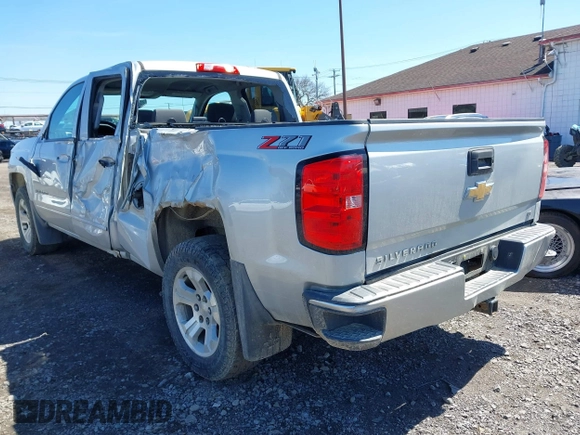 2018 Chevrolet Silverado 1500 LT with VIN 1GCVKREC8JZ237565, listed as a IAAI auction lot 42052619 with 92,790 mi miles and . Bid and sale history available at DreamBid. Image 3.