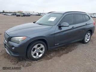 2013 BMW X1 28i with VIN WBAVM1C51DVW42577, listed as a IAAI auction lot 42029627 with 140,343 mi miles. Bid and sale history available at carsss.com. Image 2.