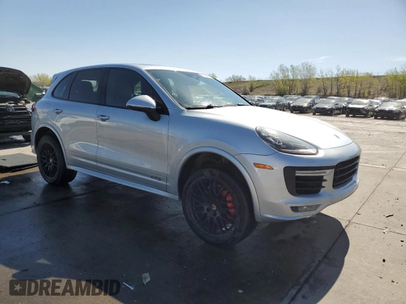 2016 Porsche Cayenne GTS with VIN WP1AD2A25GLA78110, listed as a Copart auction lot 55126705 with 118,855 mi miles and Salvage title. Bid and sale history available at DreamBid. Image 4.