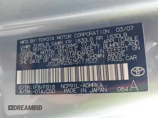 2007 Toyota Yaris with VIN JTDJT923675117537, listed as a IAAI auction lot 42116893 with 210,036 mi miles. Bid and sale history available at carsss.com. Image 9.